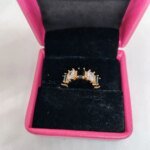 vibrant gold ring adorned with colorful gemstones. - Image 3