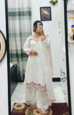 এলিগেন্ট সাদা এমব্রয়ডারি থ্রি পিস সালোয়ার কামিজ সেট উইথ পিঙ্ক ডিজাইন দুপাট্টা – প্রিমিয়াম লেডিস ড্রেস - Image 2